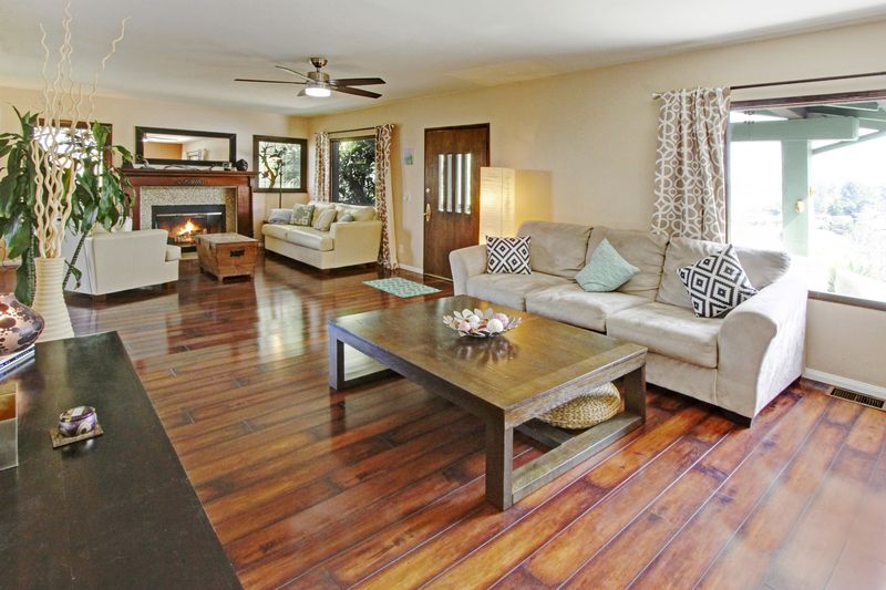 View of living room with hardwood floors