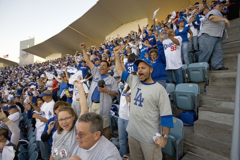Dodger fans cheering during National League Championship Series (NLCS), Dodger Stadium, Los Angeles, CA on October 12, 2008.